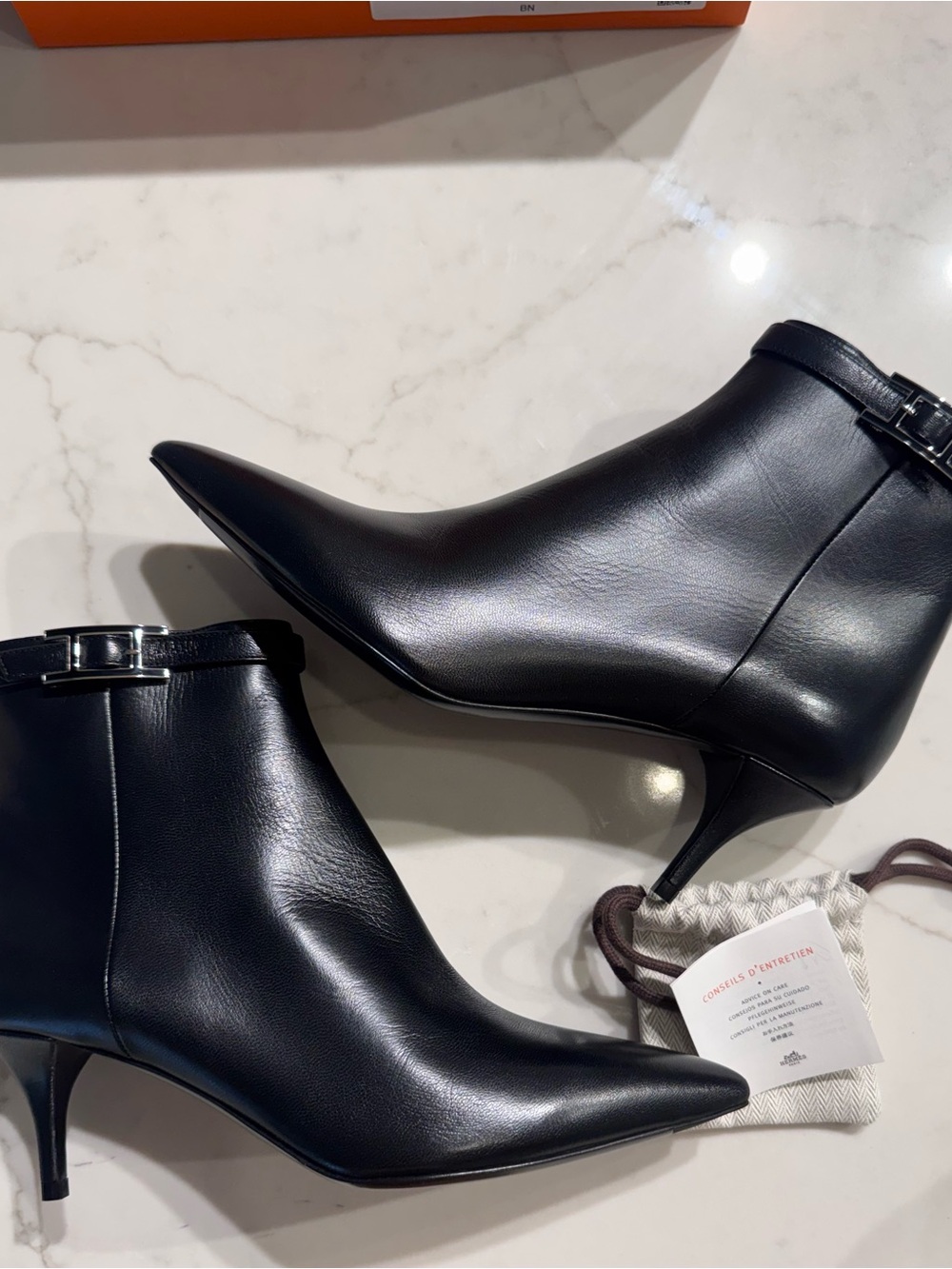 Hermes Black Leather Pointed Ankle Booties with Silver Buckle